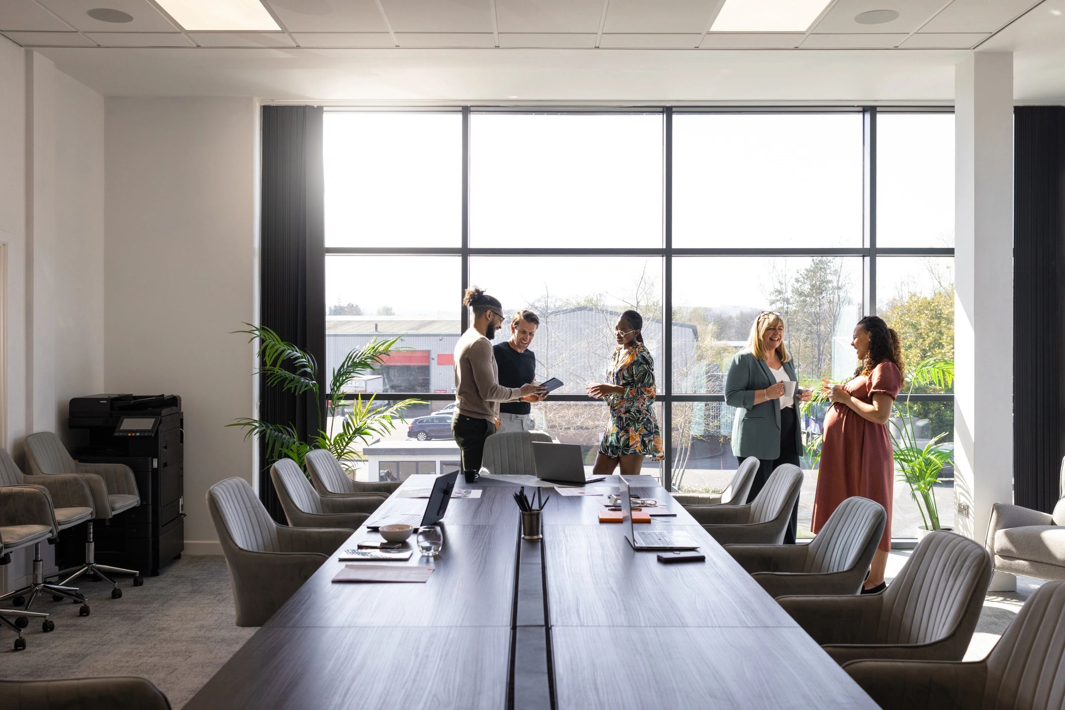 Business professionals discussing strategy in a modern office