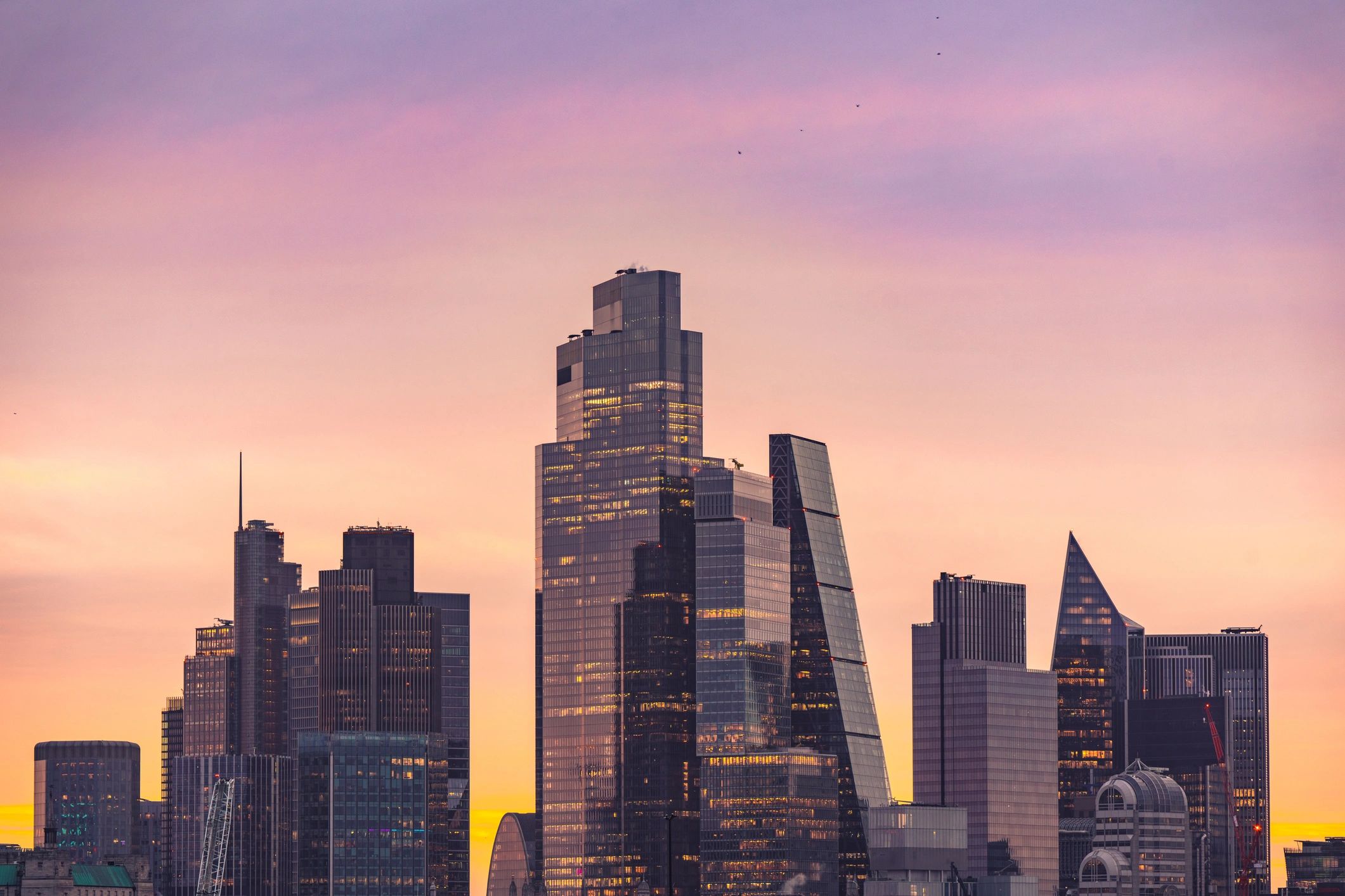 London cityscape at sunset showing modern skyscrapers